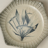 Close-up details of the one-of-a-kind plate.