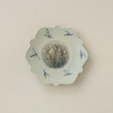 Hand-thrown and hand-glazed ceramic plate by Rookwood Pottery