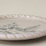 Close-up details of the one-of-a-kind plate.