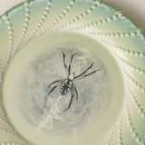Close-up details of the one-of-a-kind plate.