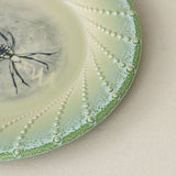 Close-up details of the one-of-a-kind plate.