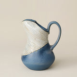 Hand-thrown and hand-glazed ceramic pitcher by Rookwood Pottery