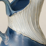 Close-up details of the one-of-a-kind pitcher.