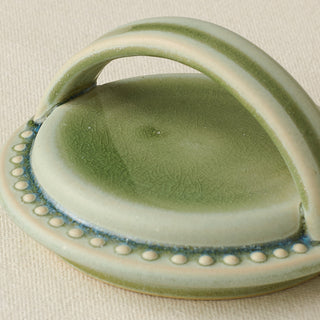 Close-up details of the one-of-a-kind canister.