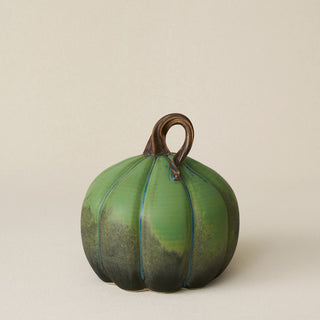 Hand-thrown and hand-glazed ceramic pumpkin by Rookwood Pottery