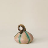 Hand-thrown and hand-glazed ceramic pumpkin by Rookwood Pottery