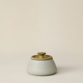 Hand-thrown and hand-glazed ceramic canister by Rookwood Pottery