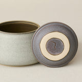 Close-up details of the one-of-a-kind canister.