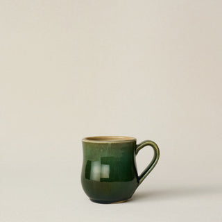Hand-thrown and hand-glazed ceramic mug by Rookwood Pottery