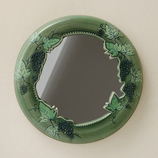 Hand-thrown and hand-glazed ceramic mirror by Rookwood Pottery