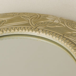 Close-up details of the one-of-a-kind mirror.