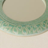 Close-up details of the one-of-a-kind mirror.