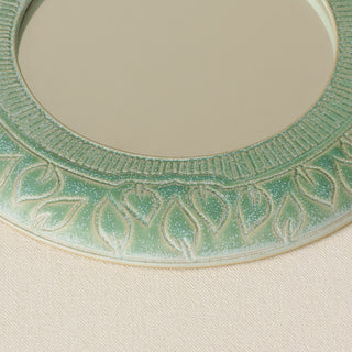 Close-up details of the one-of-a-kind mirror.