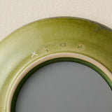 Close-up details of the one-of-a-kind mirror.
