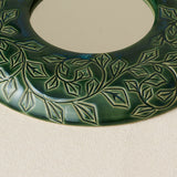 Close-up details of the one-of-a-kind mirror.