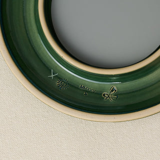 Close-up details of the one-of-a-kind mirror.