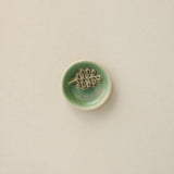 Close-up details of the one-of-a-kind jewelry dish.