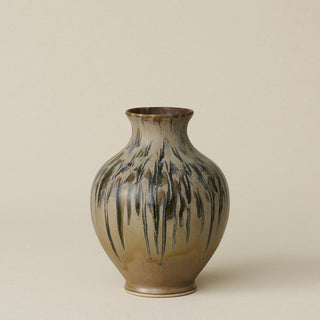 The Boule Vase by Tammy Maloney with expressive, layered glazes.