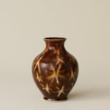 The Boule Vase by Tammy Maloney with expressive, layered glazes.