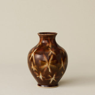The Boule Vase by Tammy Maloney with expressive, layered glazes.