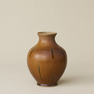 The Boule Vase by Tammy Maloney with expressive, layered glazes.
